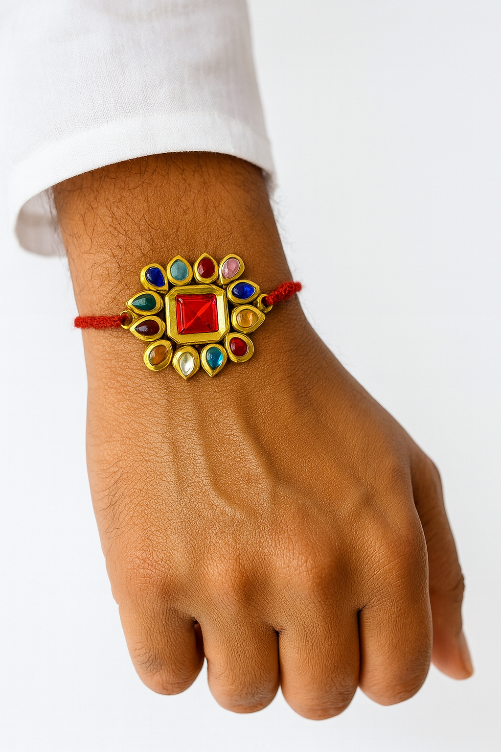 22K Gold Plated Kundan Rakhi with Square Red Centerpiece & Multicolor Petal Stones
