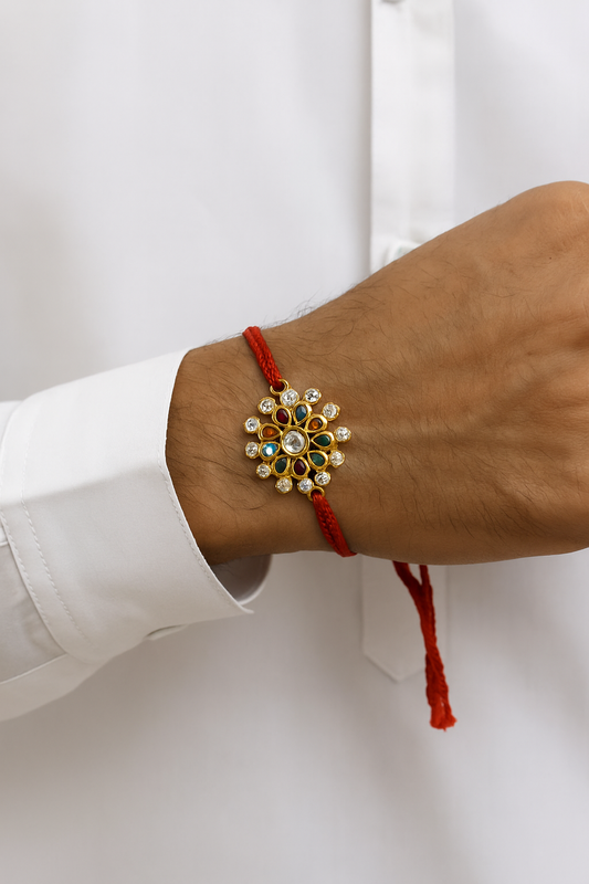 22K Gold Plated Kundan Rakhi with Shiny Stones & Red Thread