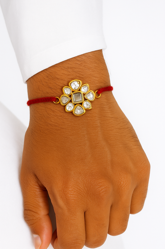 22K Gold Plated Leaf-Petal Kundan Rakhi with White Glass Stones & Red Thread