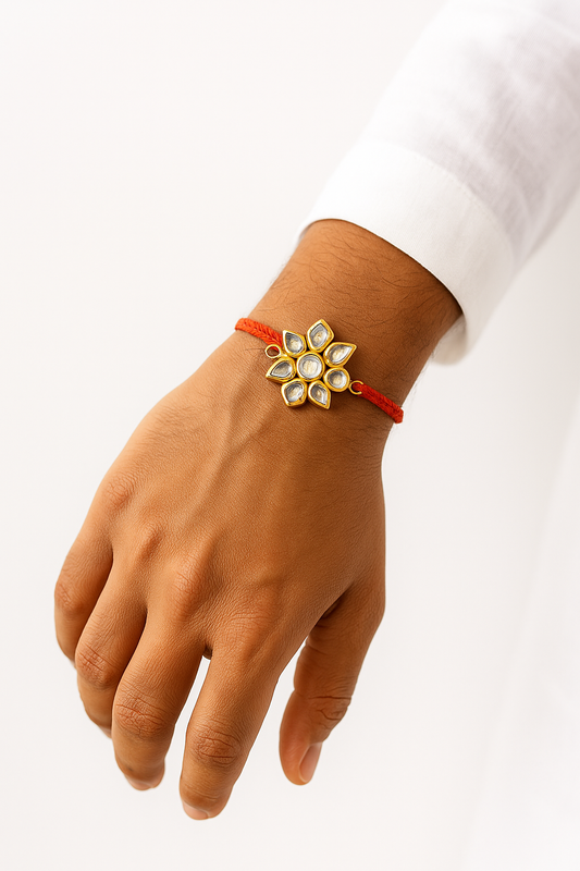 22K Gold Plated Small Petal Kundan Rakhi with White Glass Stones & Red Thread