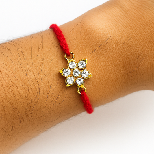 22K Gold Plated Kundan Rakhi with White Glass Cut Stones & Red Thread