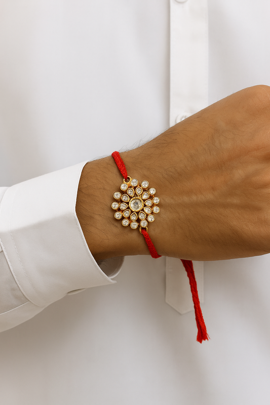 22K Gold Plated Kundan Rakhi with Shiny Stones & Red Thread