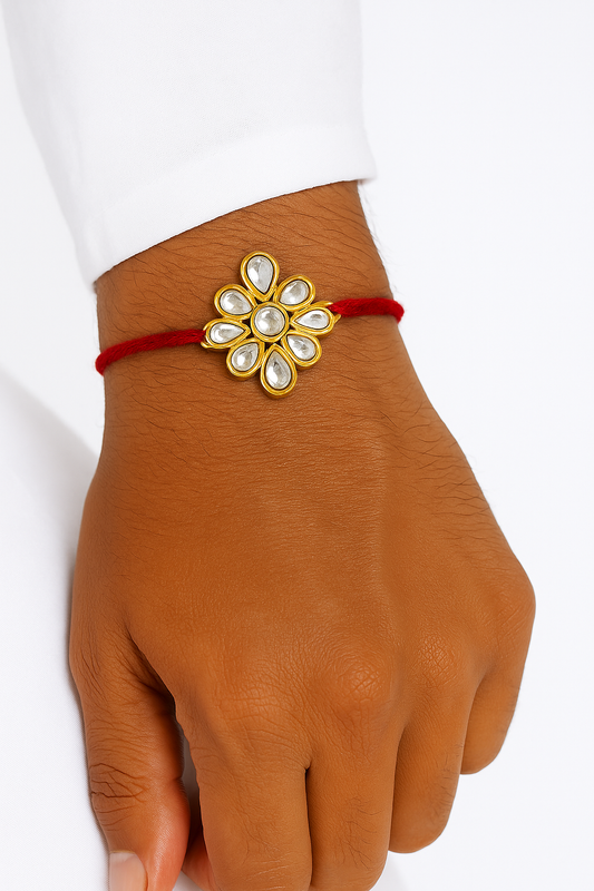 22K Gold Plated Kundan Rakhi with White Glass Stones & Red Thread