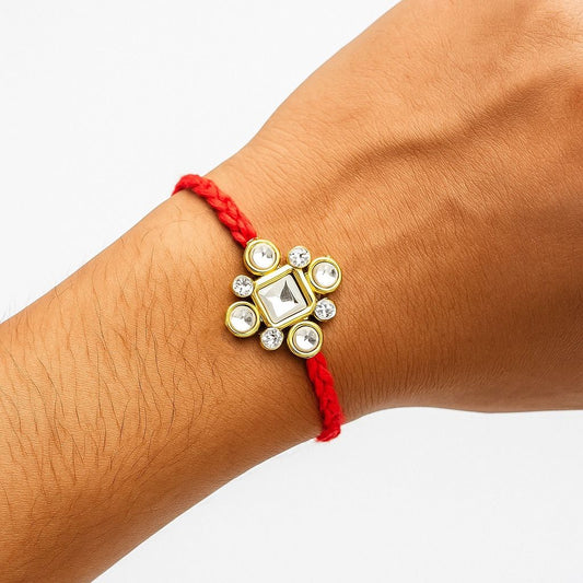 22K Gold Plated Kundan Rakhi with Clear White Stones & Red Thread